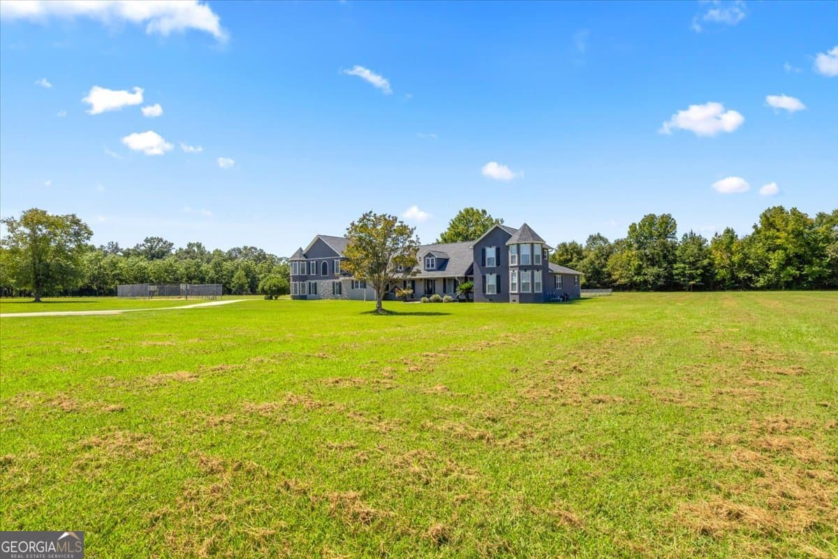 7 bedroom, 4.5 bathroom, 7,338 sq ft single family residence under contract at 156 Orion Way, Byron, GA 31008 — photo 9