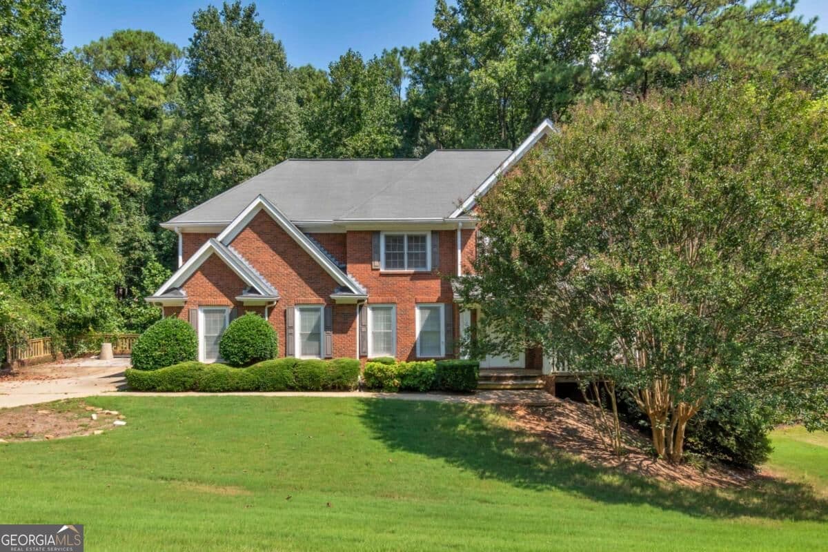 5 bedroom, 4.5 bathroom, 4,514 sq ft single family residence for sale at 5892 Millstone Lane, Stone Mountain, GA 30087 — photo 2
