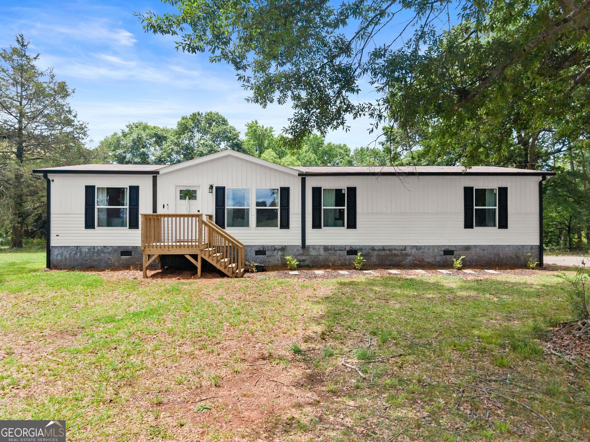 4 bedroom, 2 bathroom, 1,580 sq ft manufactured home,single family residence sold at 4046 Holly Springs Road, Gillsville, GA 30543
