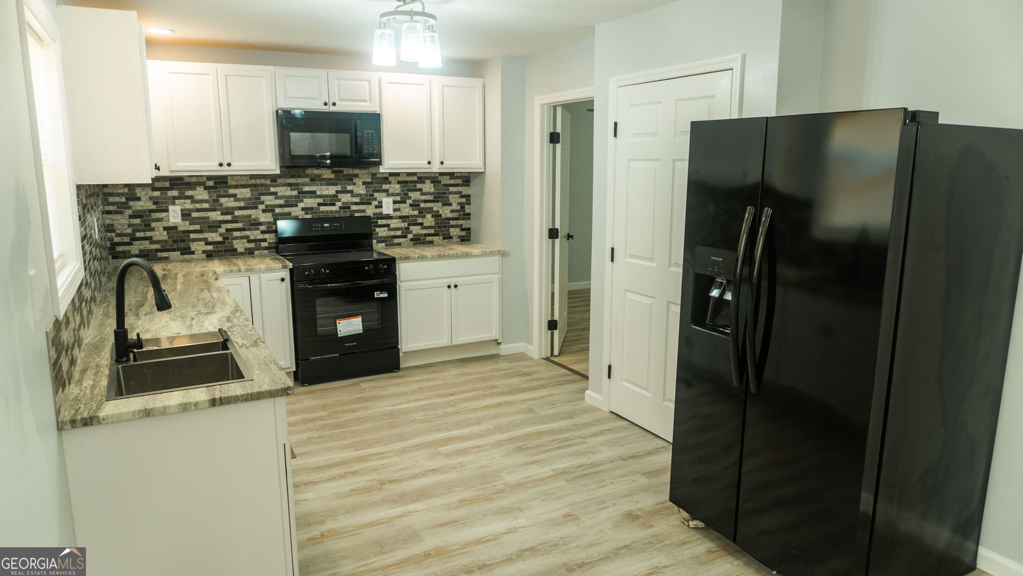 3 bedroom, 3 bathroom, 1,968 sq ft single family residence for sale at 149 Newby Road, Jeffersonville, GA 31044 — photo 5