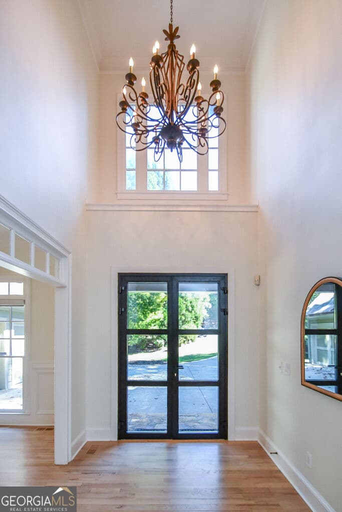 5 bedroom, 5.5 bathroom, 5,264 sq ft single family residence for sale at 1695 Windsor Cove, Milton, GA 30004 — photo 4