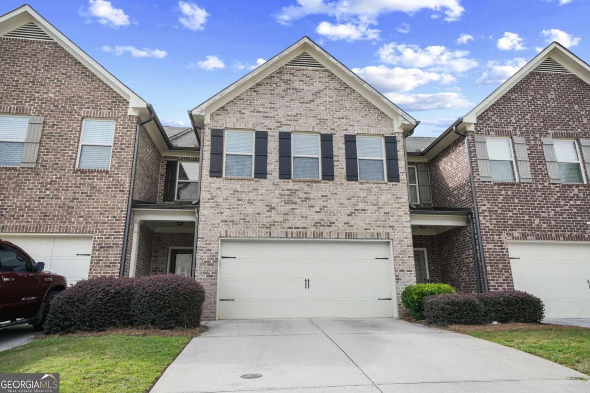 3 bedroom, 2.5 bathroom, 1,988 sq ft townhouse for sale at 244 Cross Street, Lawrenceville, GA 30046 — photo 1 of 18