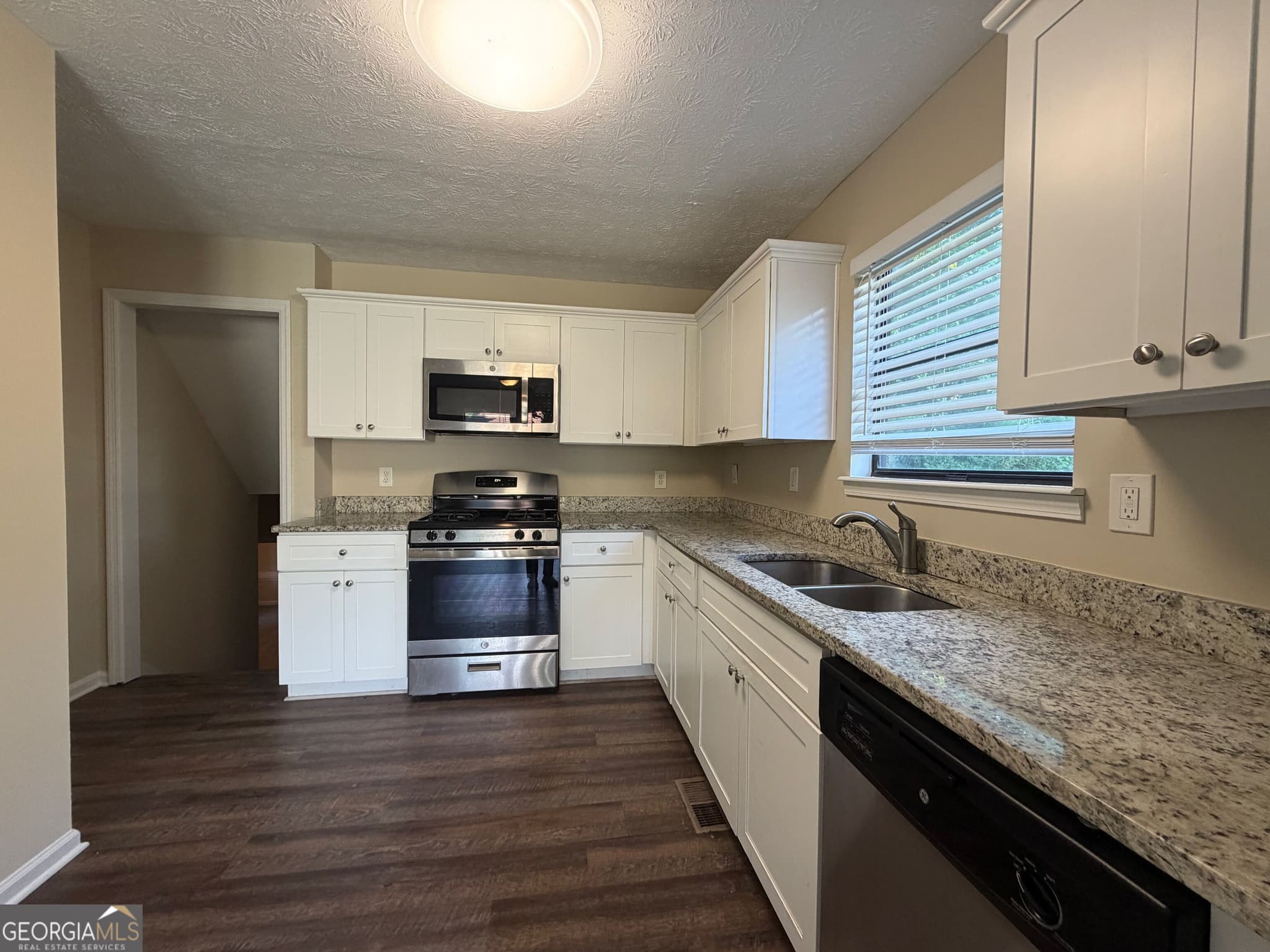 4 bedroom, 2 bathroom, 2,053 sq ft single family residence for sale at 5236 Pine Way Road, Powder Springs, GA 30127 — photo 6