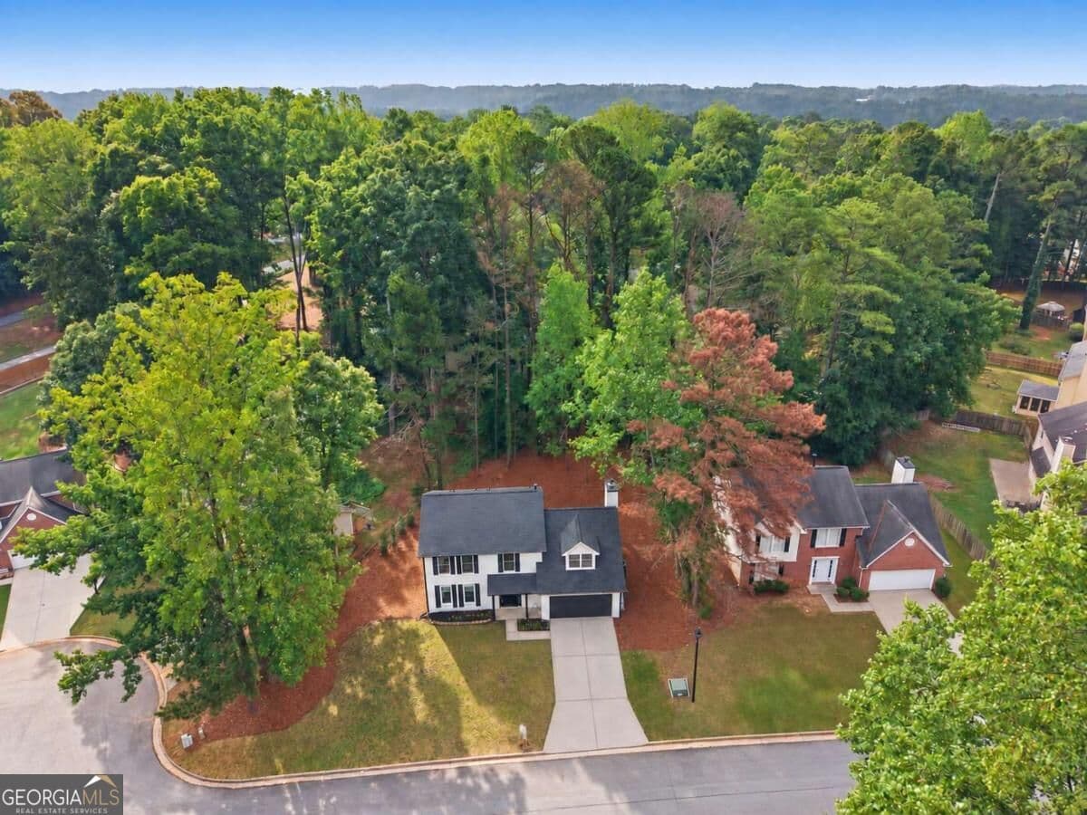 4 bedroom, 3 bathroom, 2,120 sq ft single family residence for sale at 1738 Wedgewood Drive, Stone Mountain, GA 30088 — photo 2