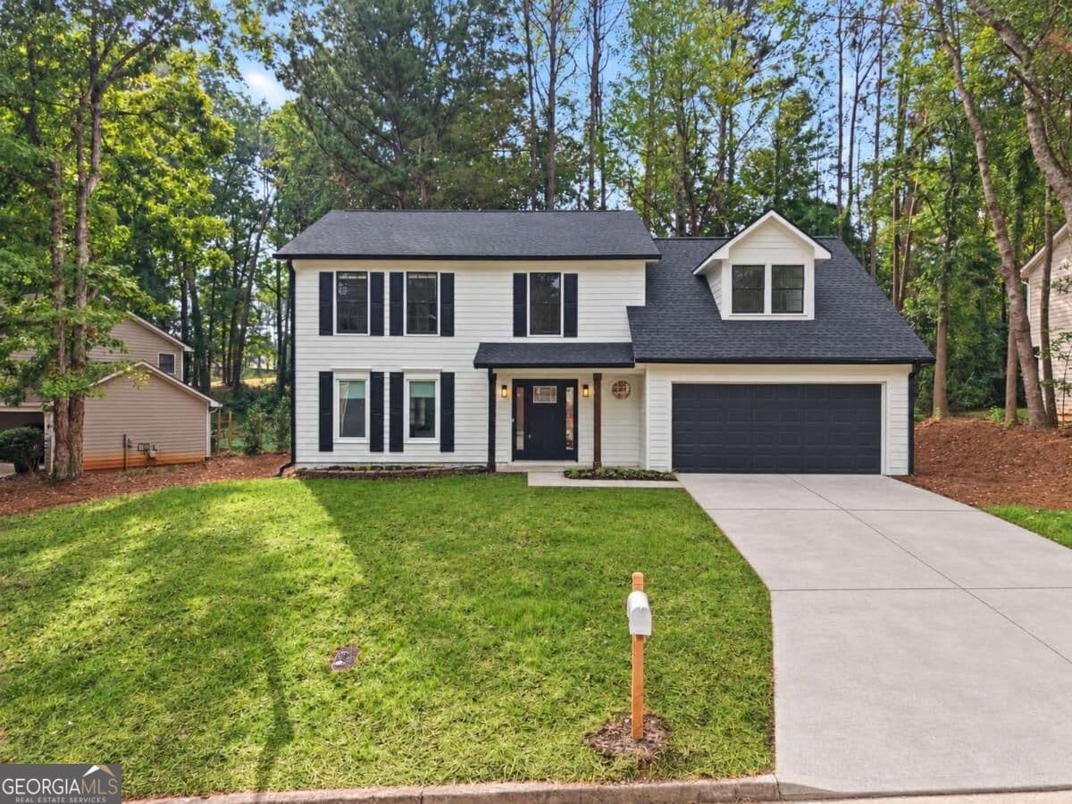 4 bedroom, 3 bathroom, 2,120 sq ft single family residence for sale at 1738 Wedgewood Drive, Stone Mountain, GA 30088 — photo 1 of 48
