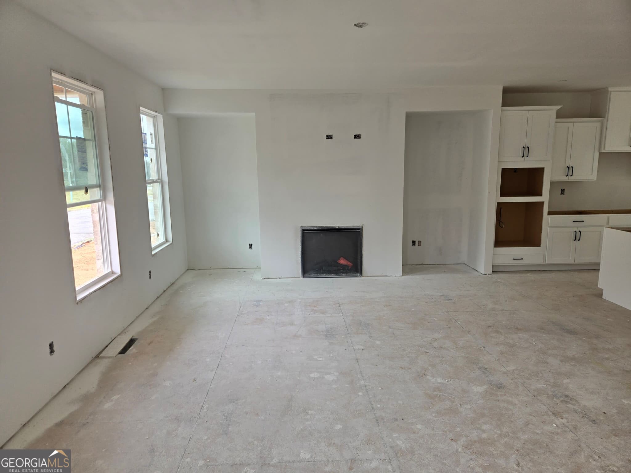 4 bedroom, 3.5 bathroom, 3,429 sq ft single family residence for sale at 983 Homepark Circle, Buford, GA 30518 — photo 4