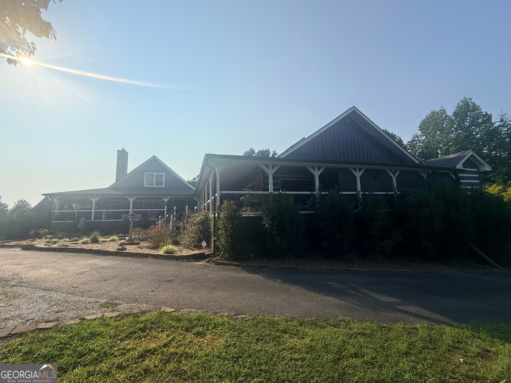 5 bedroom, 4 bathroom, 4,687 sq ft cabin,single family residence for sale at 7385 Belton Bridge Road, Lula, GA 30554 — photo 1 of 1