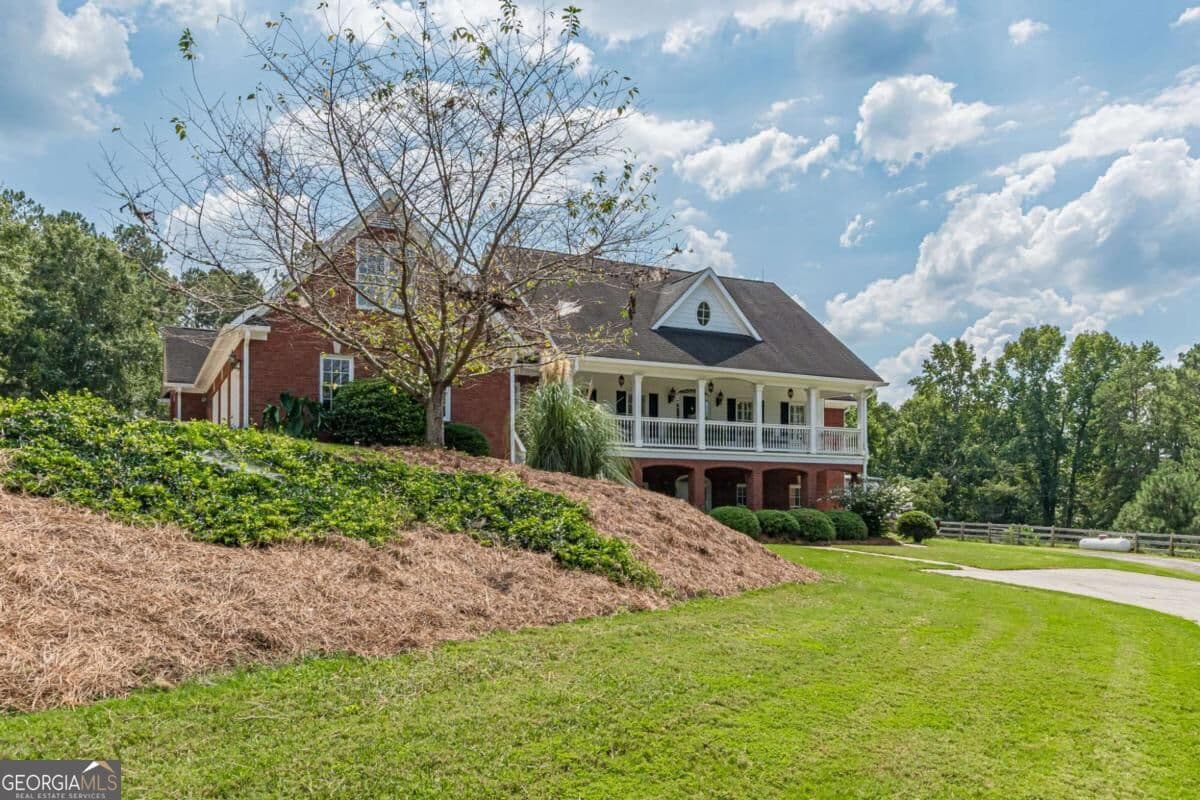 6 bedroom, 5 bathroom, 6,050 sq ft single family residence for sale at 5335 N Helton Road, Winston, GA 30187 — photo 3