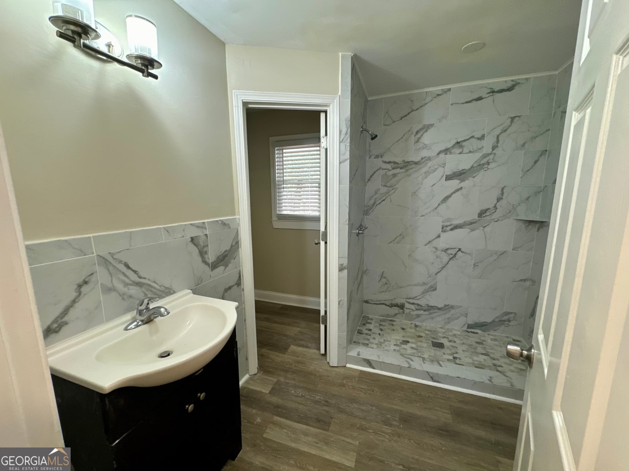 3 bedroom, 2 bathroom, 1,275 sq ft single family residence for sale at 9184 Thrash Street, Covington, GA 30014 — photo 7