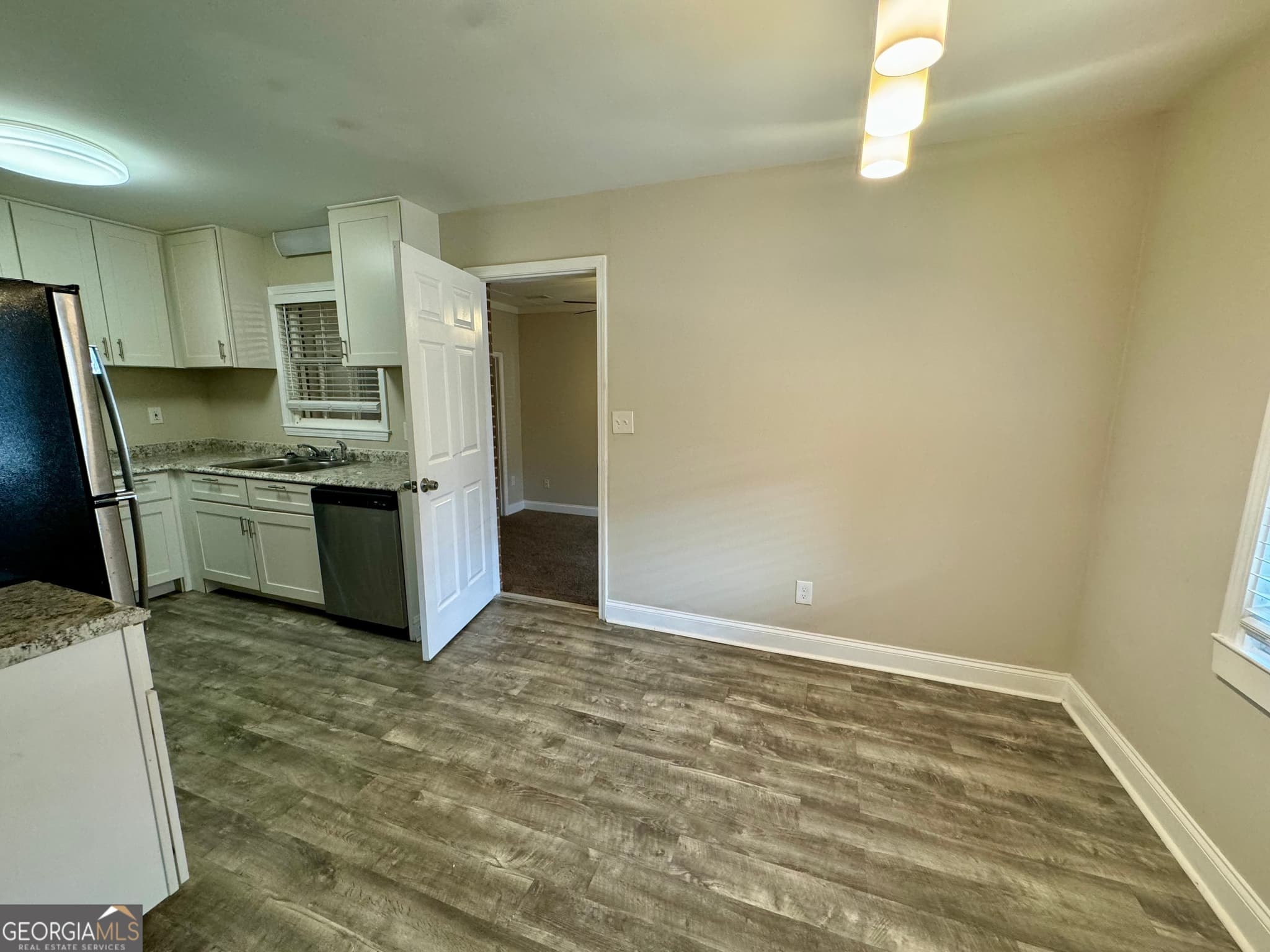3 bedroom, 2 bathroom, 1,275 sq ft single family residence for sale at 9184 Thrash Street, Covington, GA 30014 — photo 4