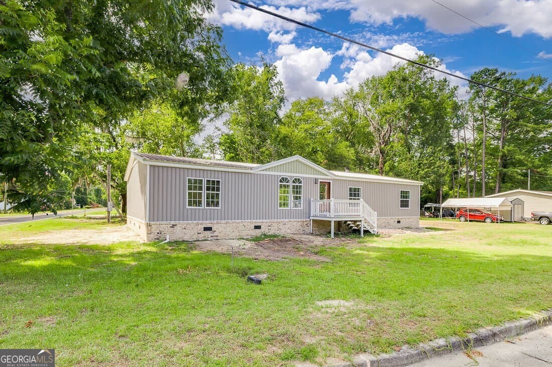 3 bedroom, 2 bathroom, 2,240 sq ft single family residence for sale at 318 Samuel Smalls Sr Avenue, Guyton, GA 31312 — photo 3