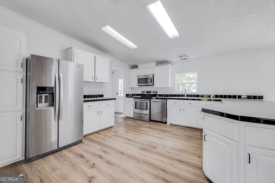 3 bedroom, 2 bathroom, 2,240 sq ft single family residence for sale at 318 Samuel Smalls Sr Avenue, Guyton, GA 31312 — photo 9