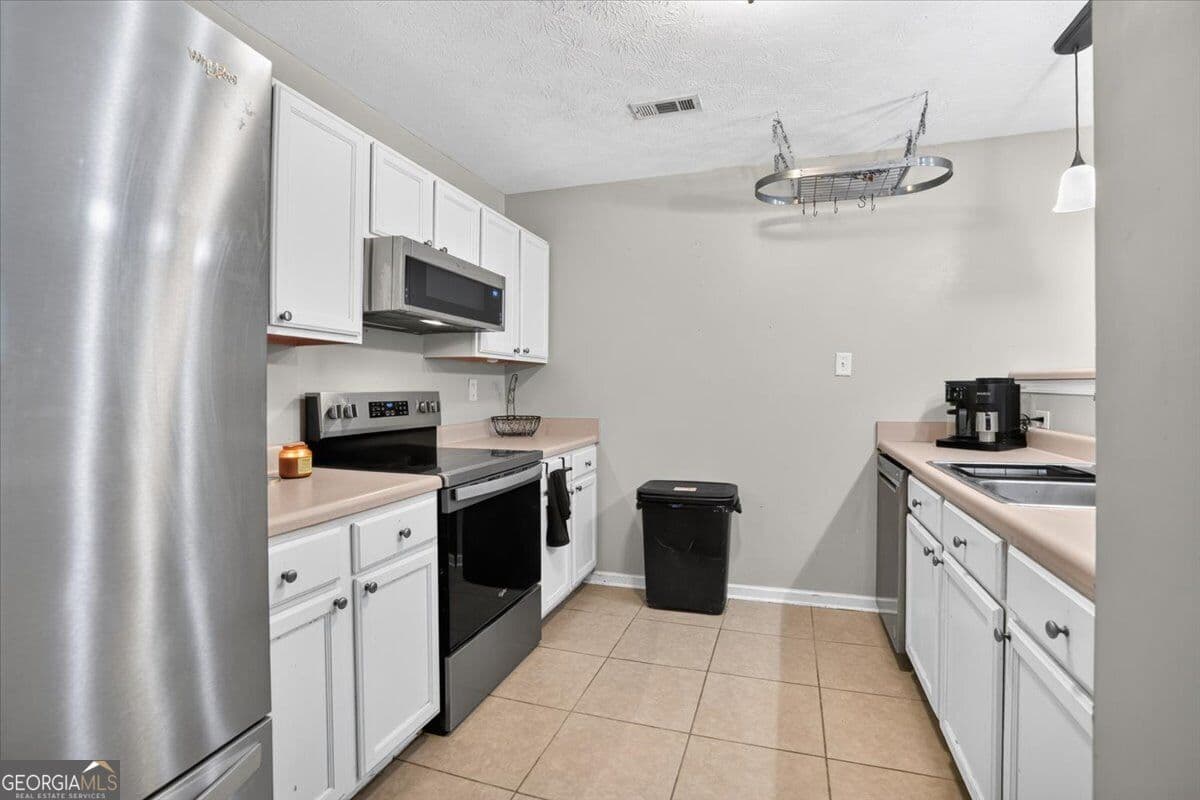 3 bedroom, 2 bathroom, 1,400 sq ft single family residence for sale at 50 Tomkins Creek Trail, Forsyth, GA 31029 — photo 6