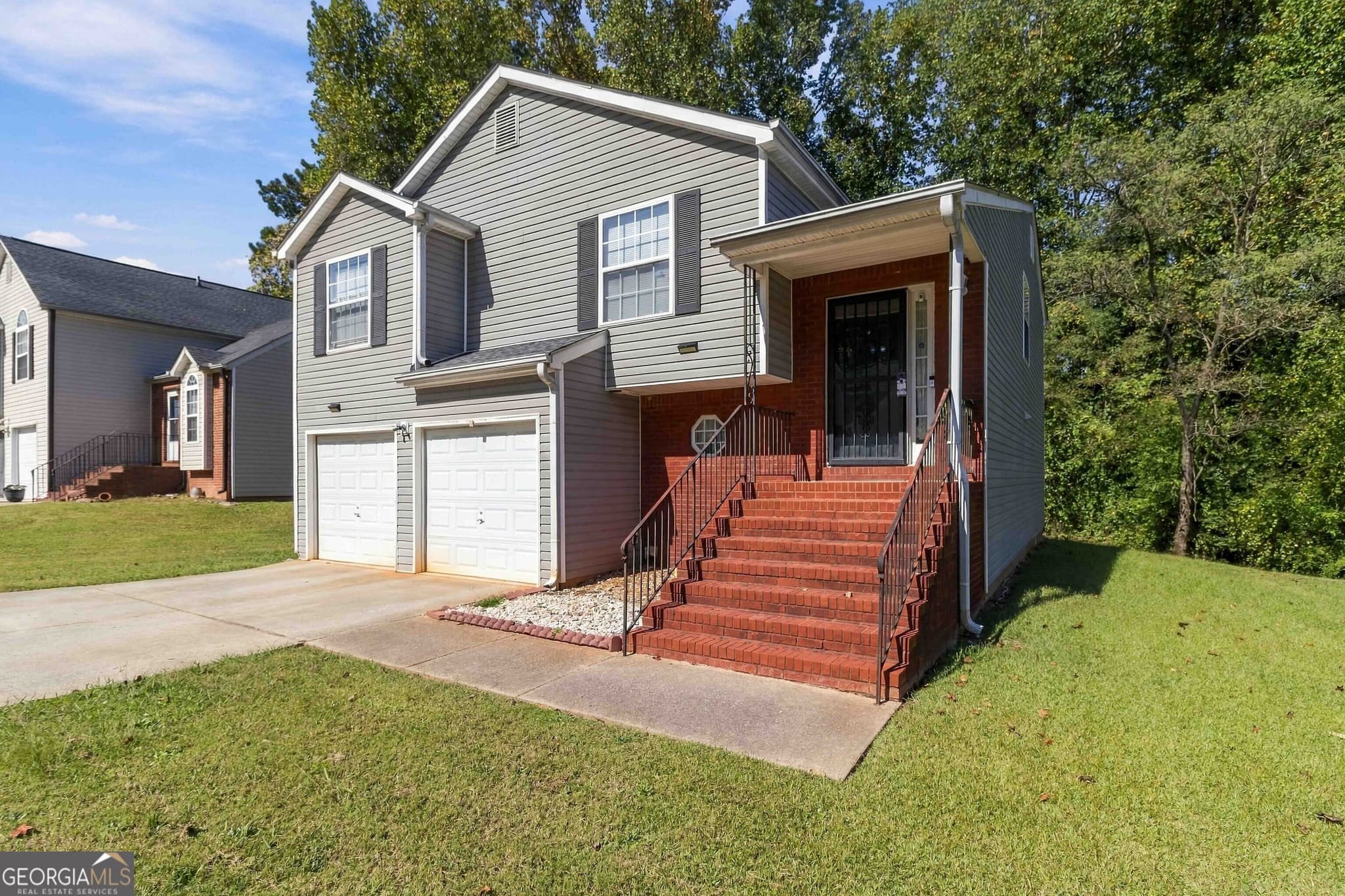 4 bedroom, 3 bathroom, 2,014 sq ft single family residence for sale at 357 Summit Lane, Riverdale, GA 30274 — photo 2