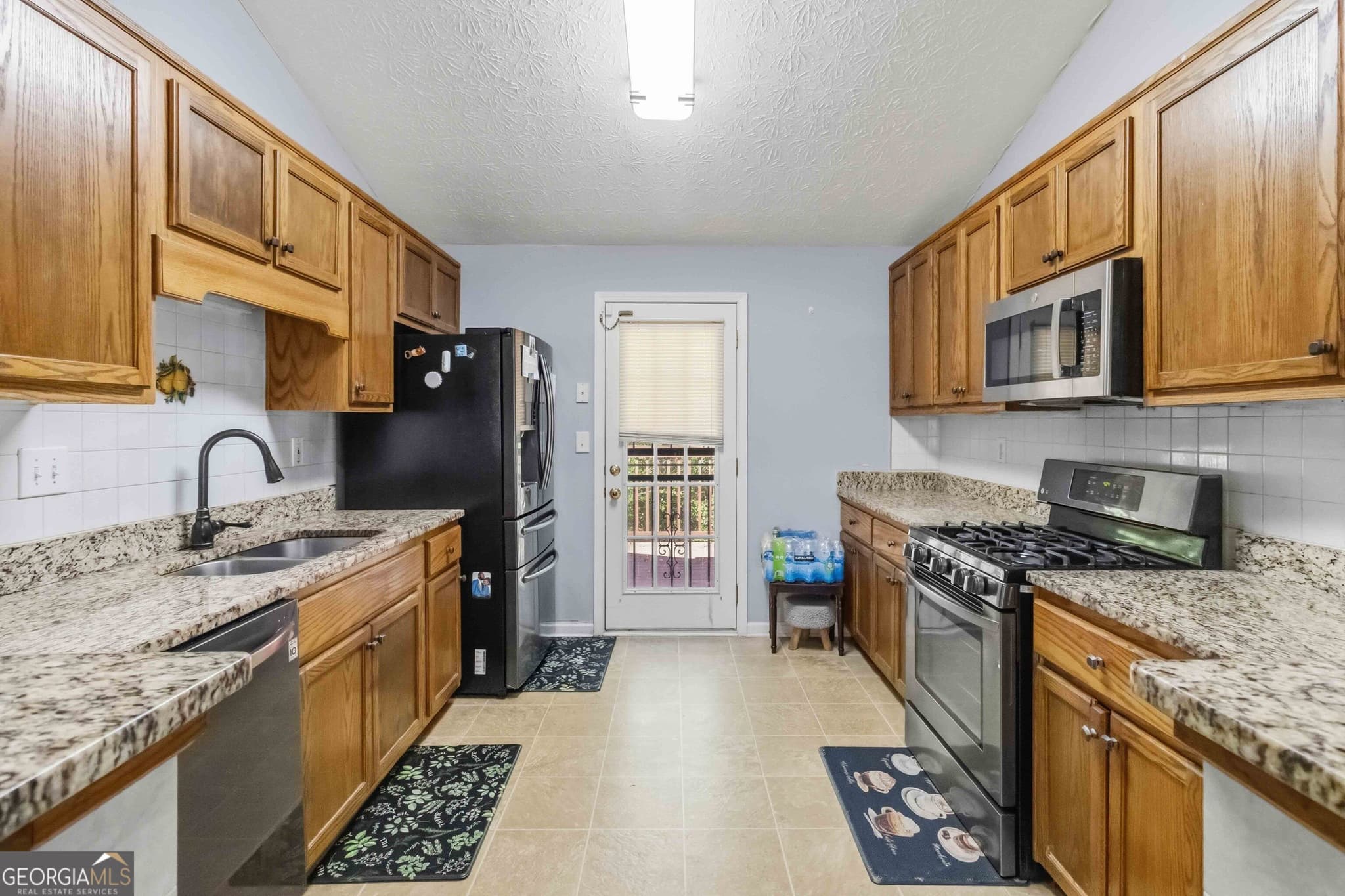 4 bedroom, 3 bathroom, 2,014 sq ft single family residence for sale at 357 Summit Lane, Riverdale, GA 30274 — photo 5