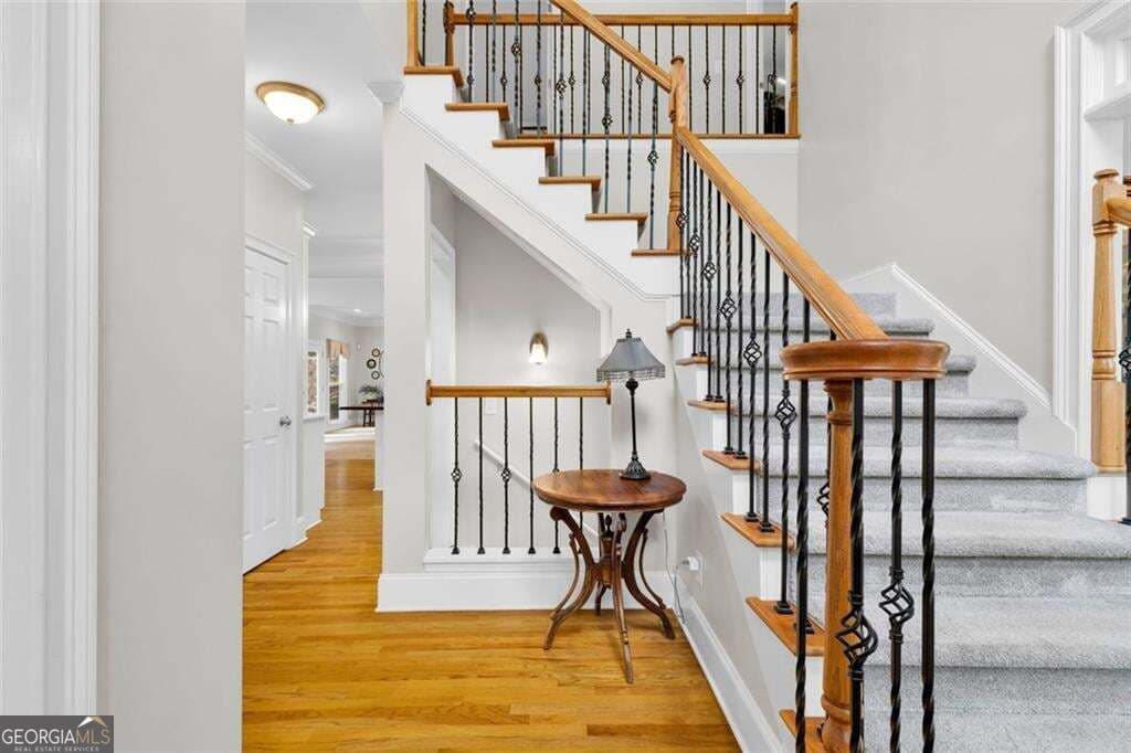 5 bedroom, 4 bathroom, 5,465 sq ft single family residence for sale at 5021 Towne Lake Hills, Woodstock, GA 30189 — photo 7