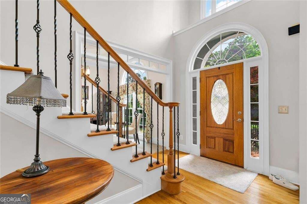 5 bedroom, 4 bathroom, 5,465 sq ft single family residence for sale at 5021 Towne Lake Hills, Woodstock, GA 30189 — photo 8