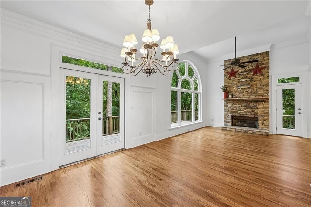 4 bedroom, 3.5 bathroom, 4,020 sq ft single family residence for sale at 4325 Little Falls Drive, Cumming, GA 30041 — photo 4