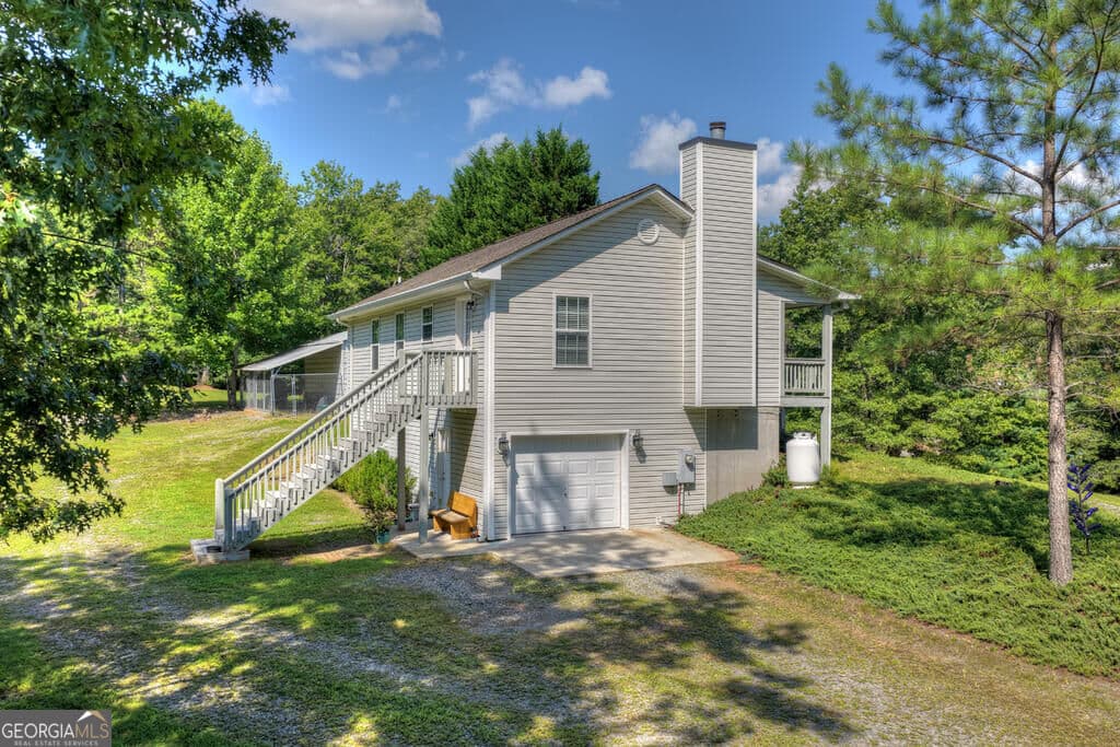 3 bedroom, 2 bathroom, 2,304 sq ft single family residence for sale at 96 Creekside Drive, Mccaysville, GA 30555 — photo 4