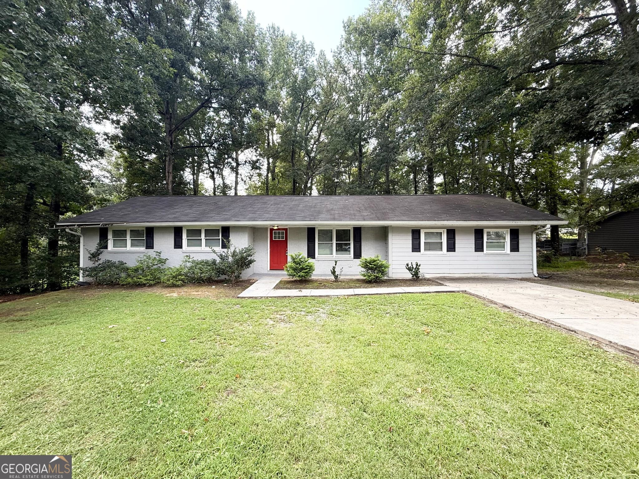 5 bedroom, 2 bathroom, 1,453 sq ft single family residence for sale at 1809 Old Peachtree Road, Lawrenceville, GA 30043 — photo 2