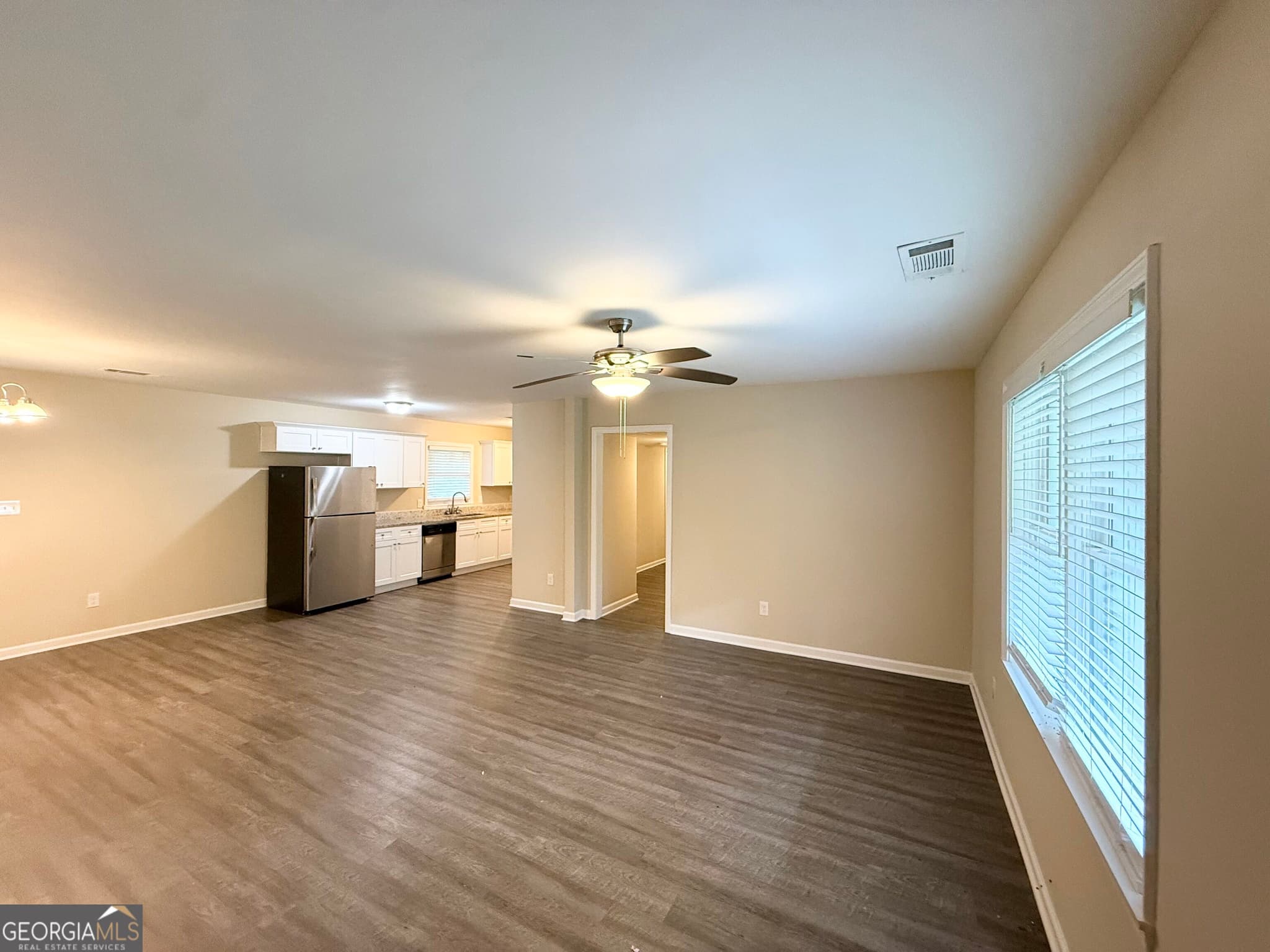 5 bedroom, 2 bathroom, 1,453 sq ft single family residence for sale at 1809 Old Peachtree Road, Lawrenceville, GA 30043 — photo 3