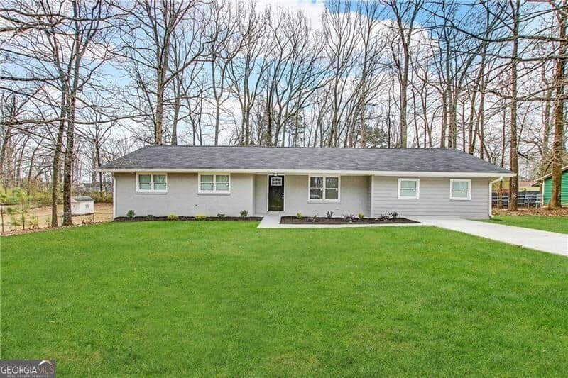 5 bedroom, 2 bathroom, 1,453 sq ft single family residence for sale at 1809 Old Peachtree Road, Lawrenceville, GA 30043