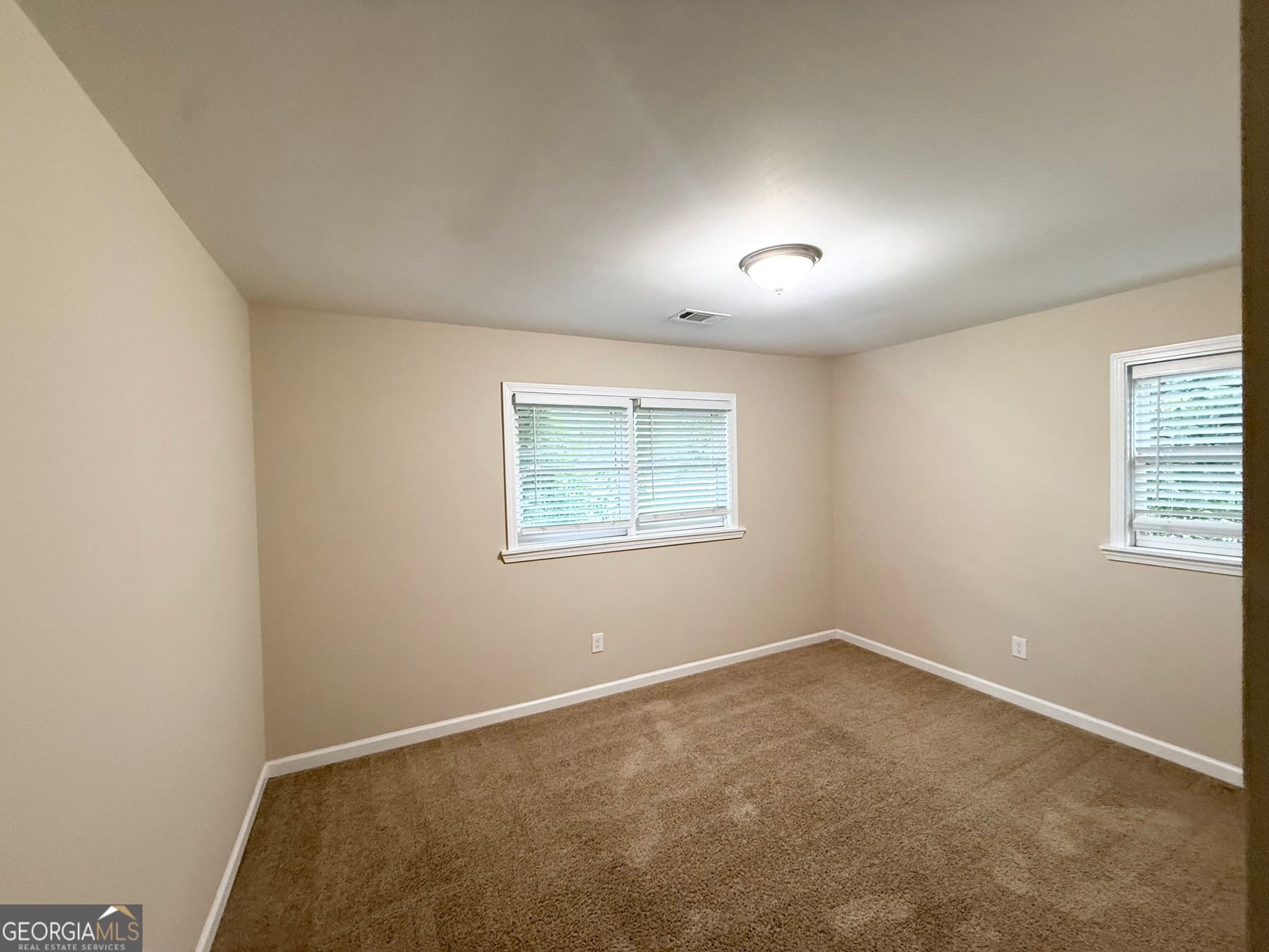 5 bedroom, 2 bathroom, 1,453 sq ft single family residence for sale at 1809 Old Peachtree Road, Lawrenceville, GA 30043 — photo 10