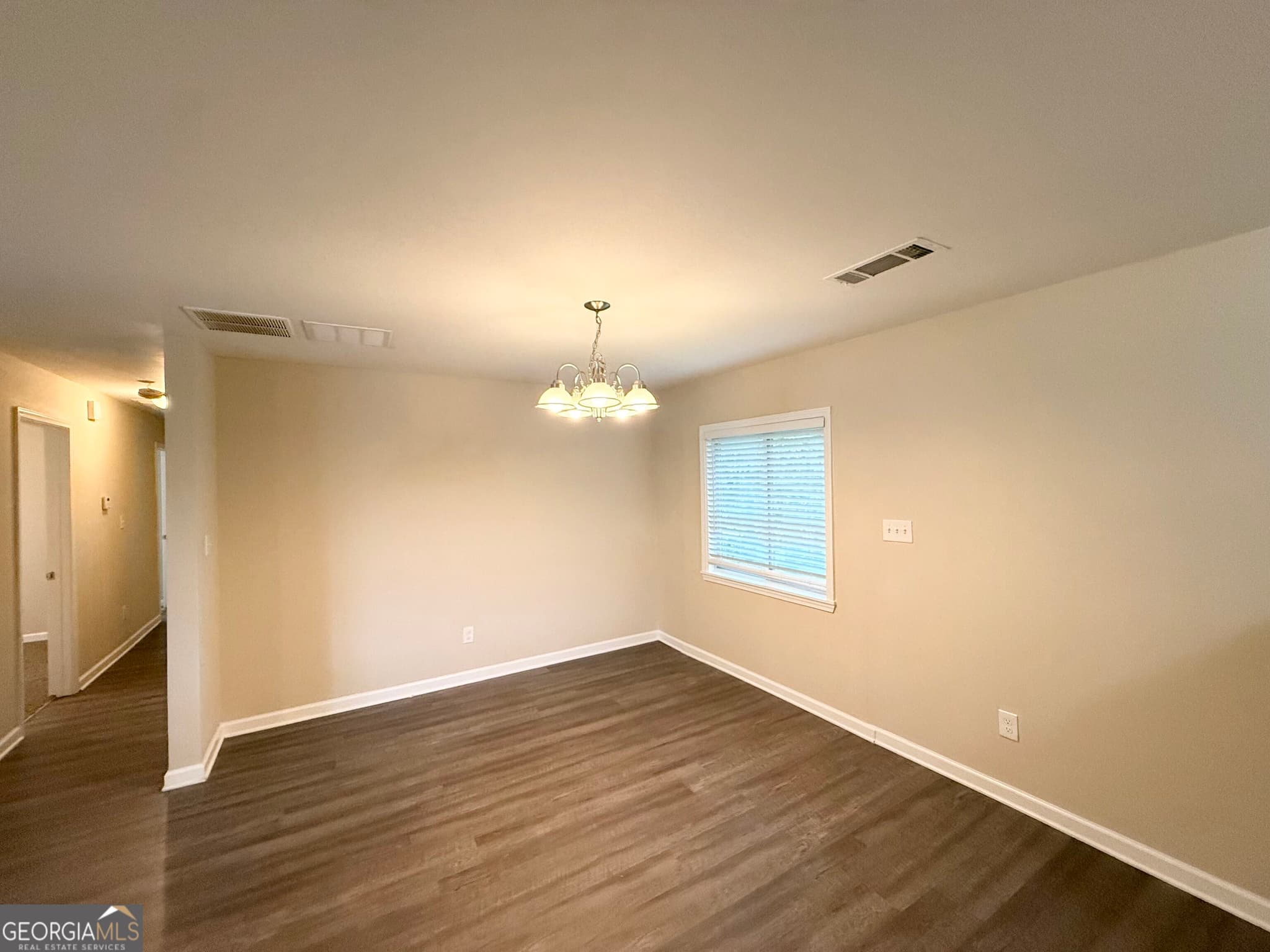 5 bedroom, 2 bathroom, 1,453 sq ft single family residence for sale at 1809 Old Peachtree Road, Lawrenceville, GA 30043 — photo 4