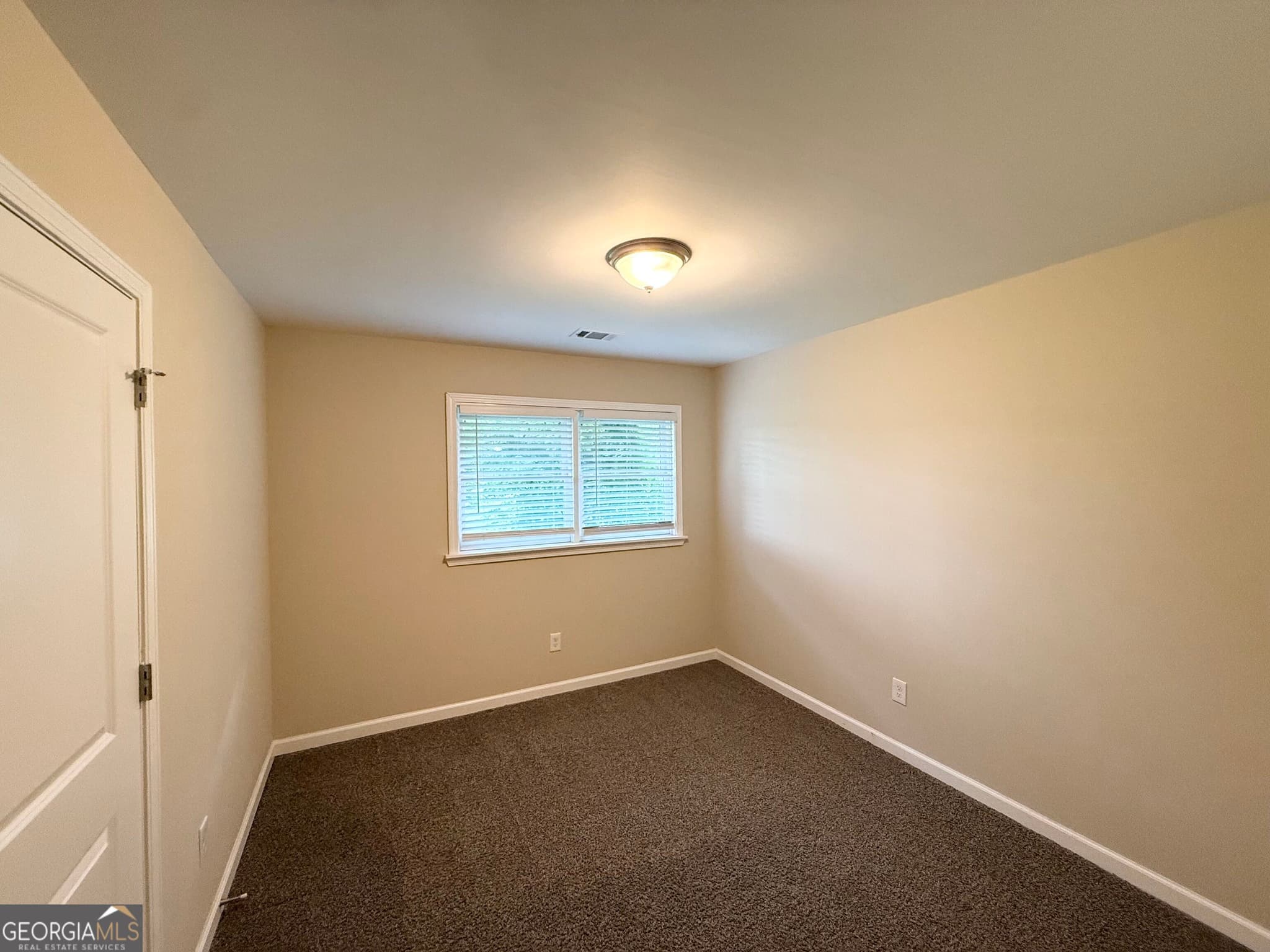 5 bedroom, 2 bathroom, 1,453 sq ft single family residence for sale at 1809 Old Peachtree Road, Lawrenceville, GA 30043 — photo 8