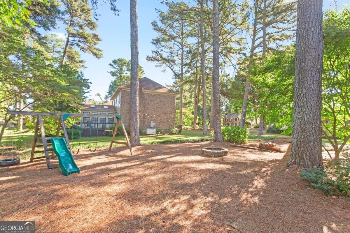 4 bedroom, 2.5 bathroom, 2,726 sq ft single family residence for sale at 724 Lanford Springs Drive, Lilburn, GA 30047 — photo 4