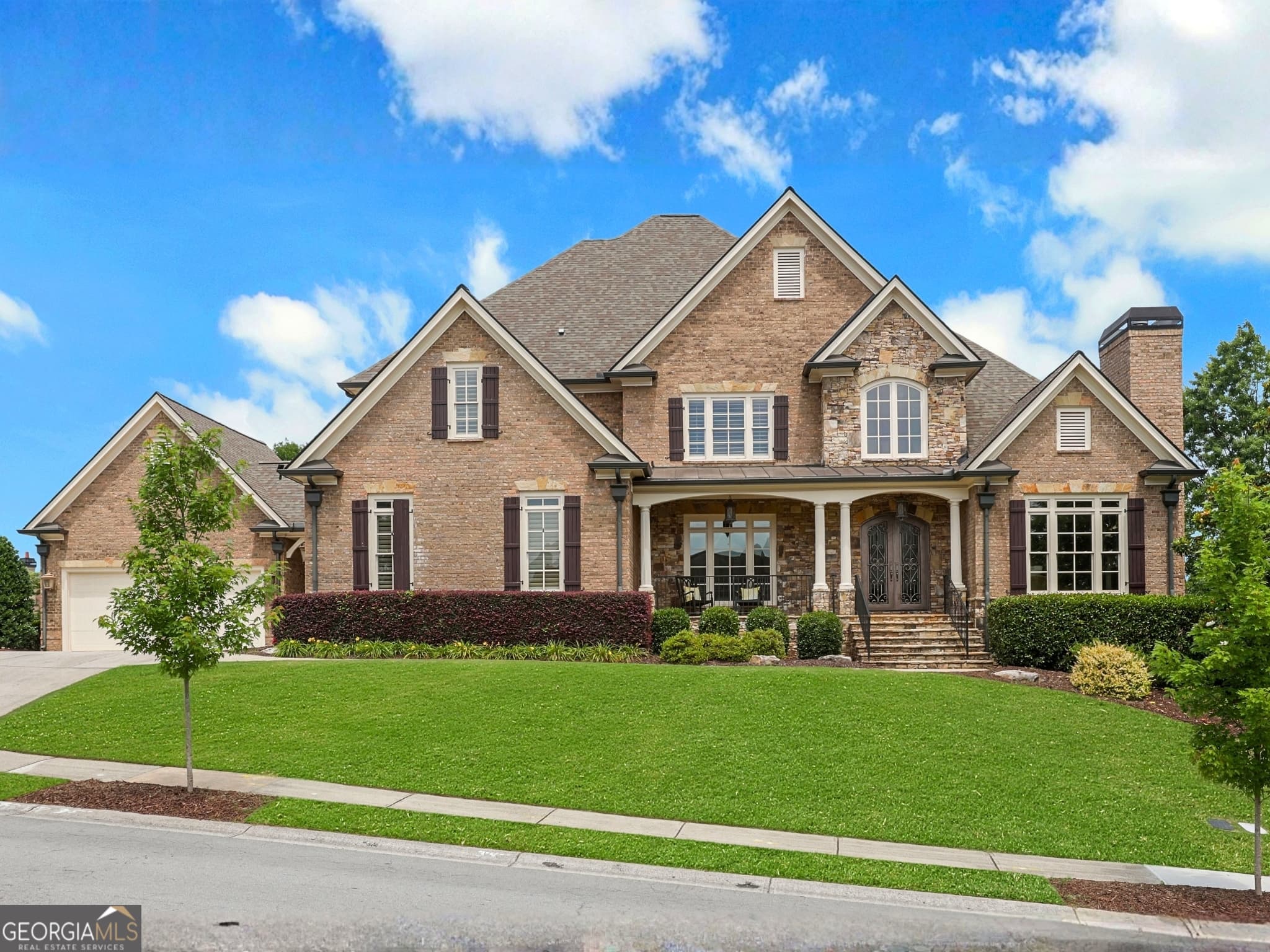 6 bedroom, 8 bathroom, 9,035 sq ft single family residence for sale at 2262 Crimson King Drive, Braselton, GA 30517