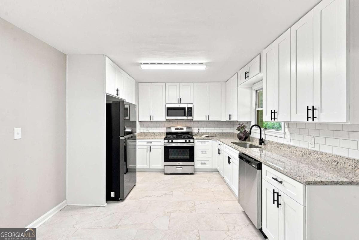 3 bedroom, 1.5 bathroom, 1,388 sq ft single family residence for sale at 2167 Cloverdale Drive, Atlanta, GA 30316 — photo 9