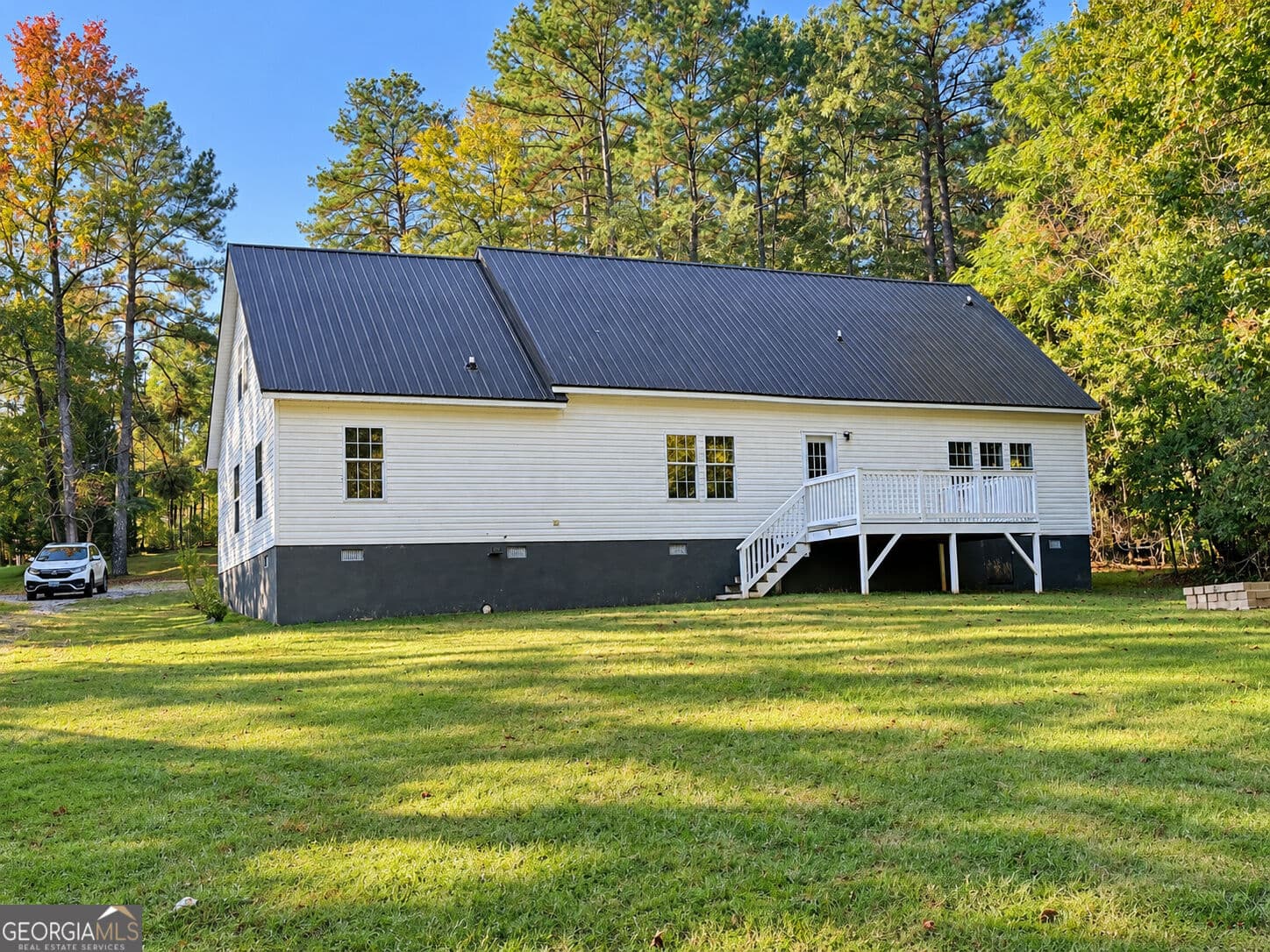 3 bedroom, 3 bathroom, 3,015 sq ft single family residence for sale at 3027 Mccomb Court, Milledgeville, GA 31061 — photo 2