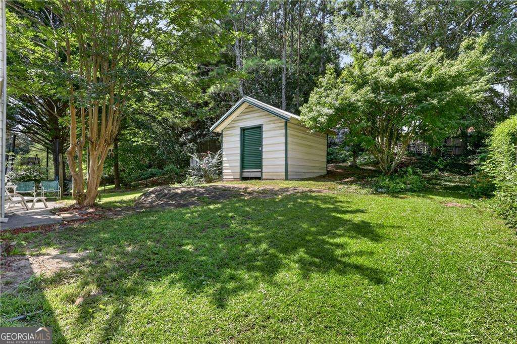 3 bedroom, 2 bathroom, 1,462 sq ft single family residence for sale at 705 Allens Landing Drive, Lawrenceville, GA 30045 — photo 4