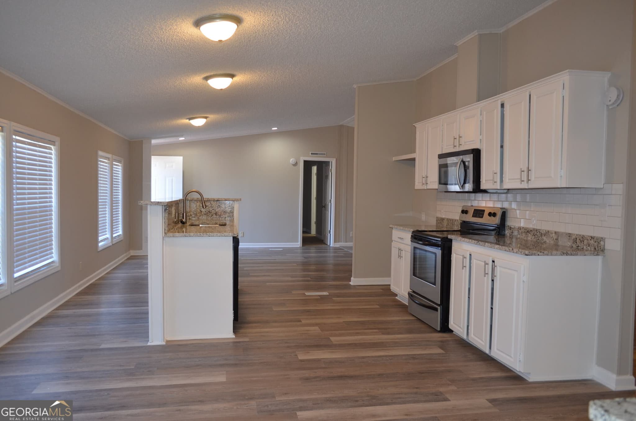 3 bedroom, 2 bathroom, 1,984 sq ft manufactured home,single family residence for sale at 138 Strickland Loop, Forsyth, GA 31029 — photo 7