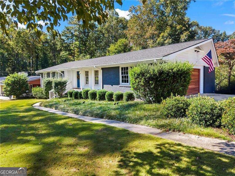 4 bedroom, 3.5 bathroom, 3,005 sq ft single family residence for sale at 4000 N Cooper Lake Road, Smyrna, GA 30082 — photo 2