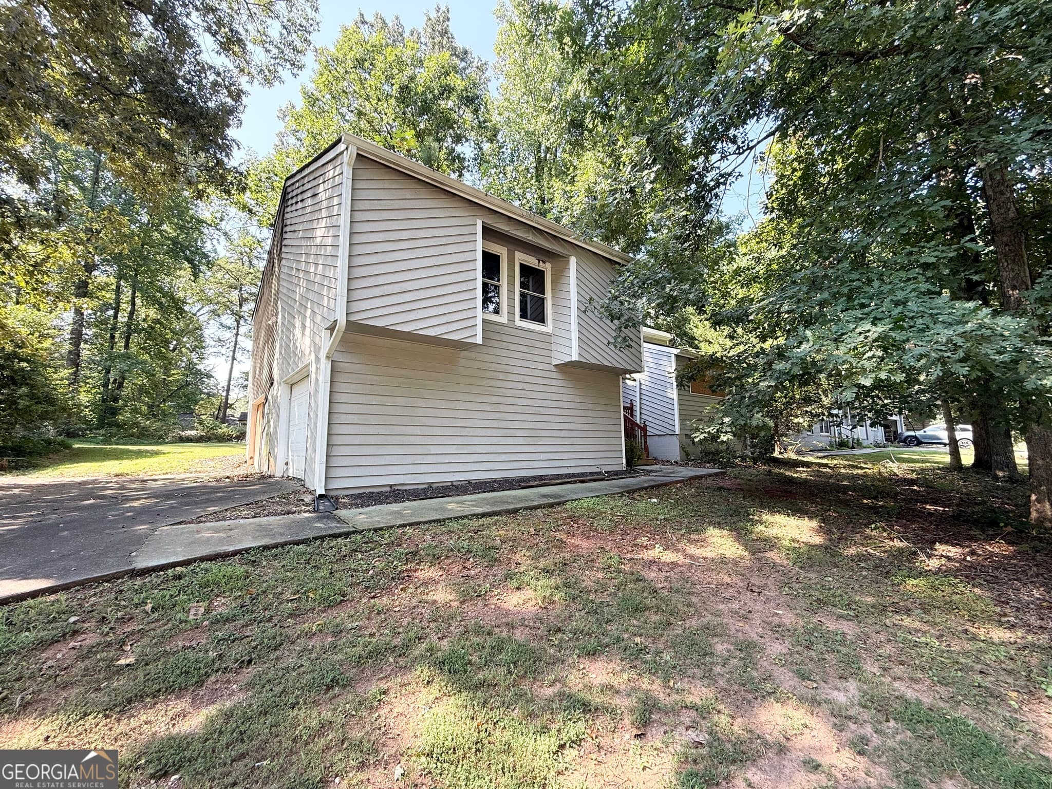 3 bedroom, 2 bathroom, 1,892 sq ft single family residence for sale at 704 Lost Creek Circle, Stone Mountain, GA 30088 — photo 2