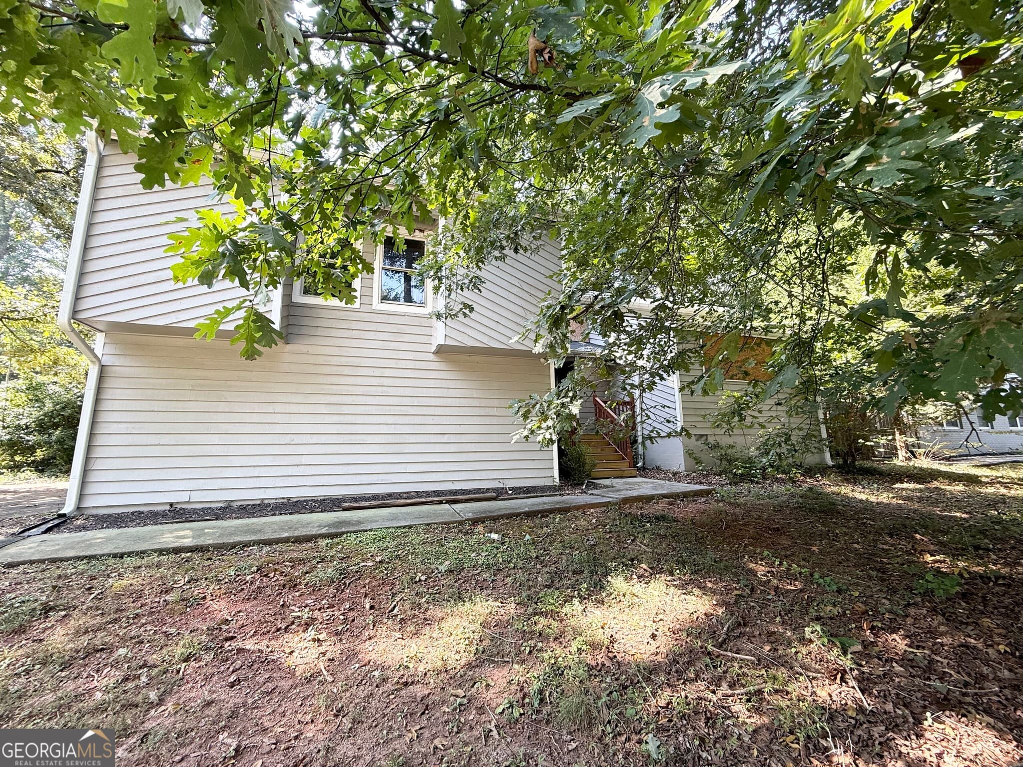 3 bedroom, 2 bathroom, 1,892 sq ft single family residence for sale at 704 Lost Creek Circle, Stone Mountain, GA 30088 — photo 3