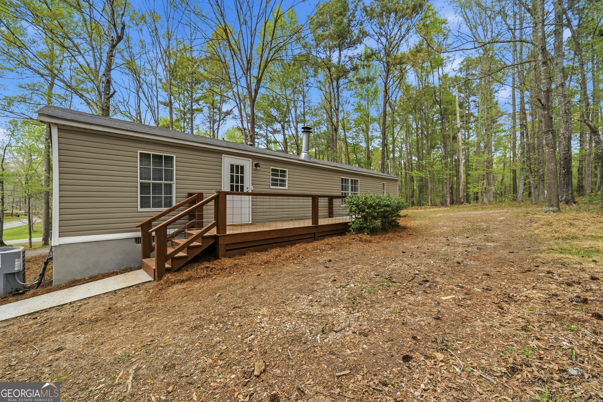 3 bedroom, 2 bathroom, 1,248 sq ft manufactured home,single family residence for sale at 279 Possum Point Drive, Eatonton, GA 31024 — photo 2