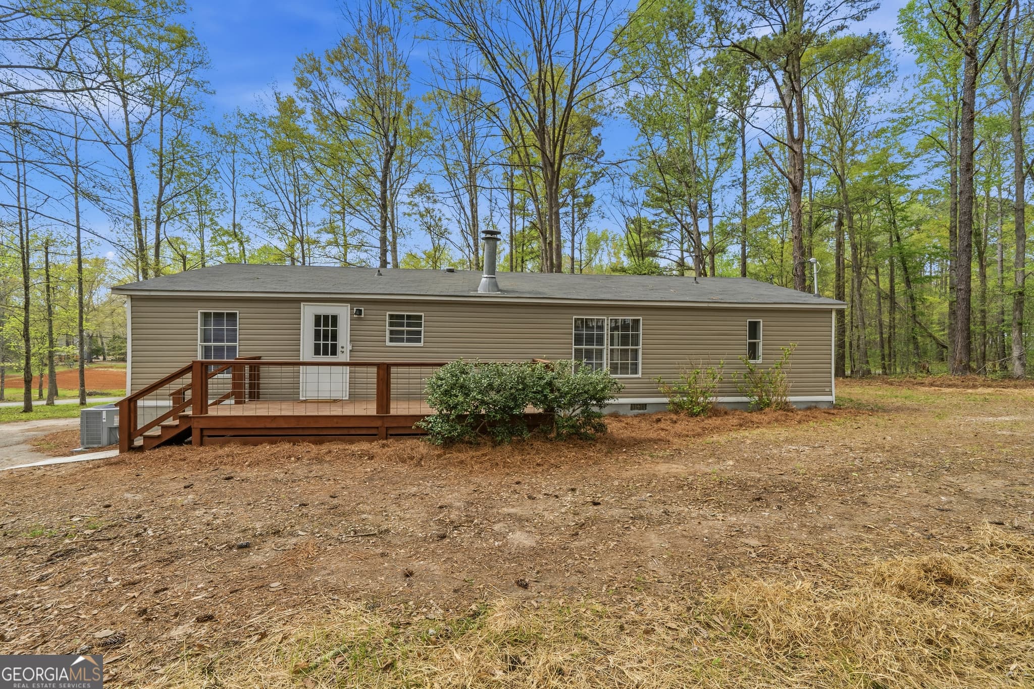 3 bedroom, 2 bathroom, 1,248 sq ft manufactured home,single family residence for sale at 279 Possum Point Drive, Eatonton, GA 31024 — photo 3