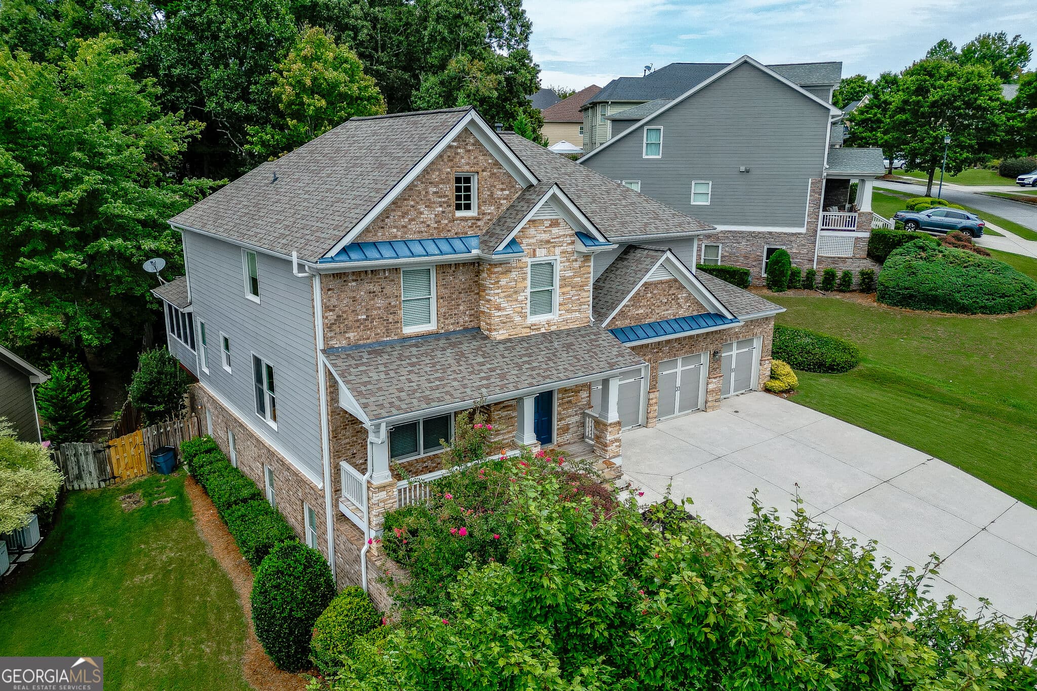7 bedroom, 6 bathroom, 5,086 sq ft single family residence for sale at 7563 Brookstone Circle, Flowery Branch, GA 30542 — photo 3