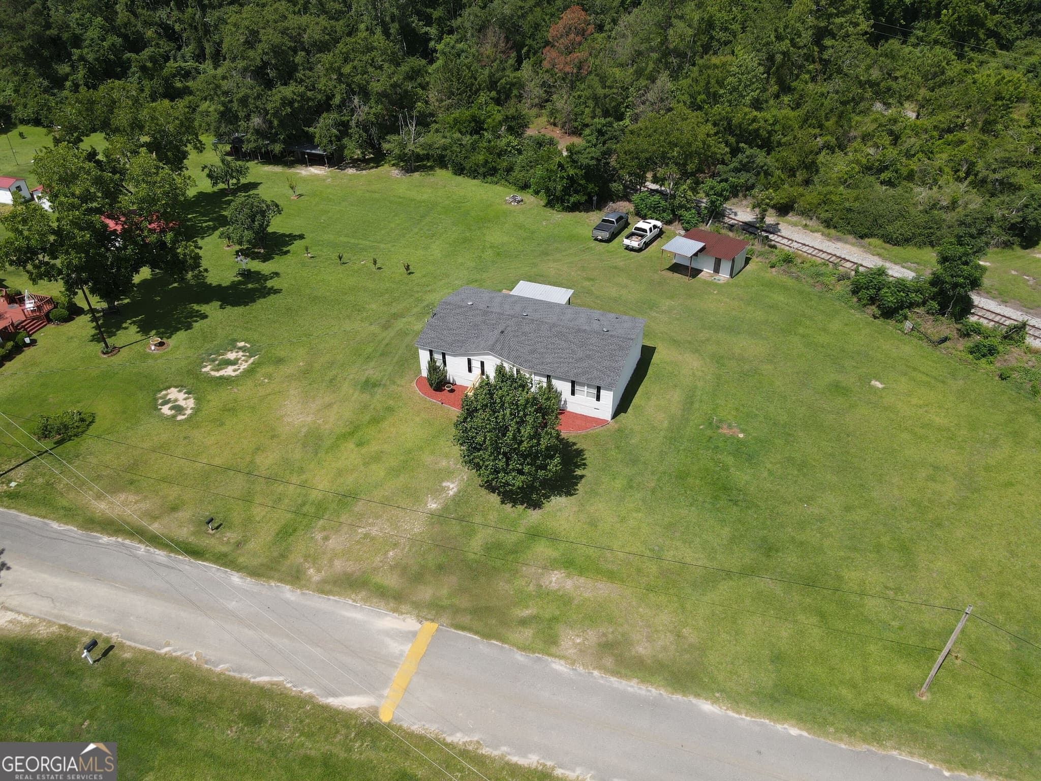 4 bedroom, 2 bathroom, 1,664 sq ft manufactured home,single family residence for sale at 10 Humpback Street, Midville, GA 30441 — photo 2