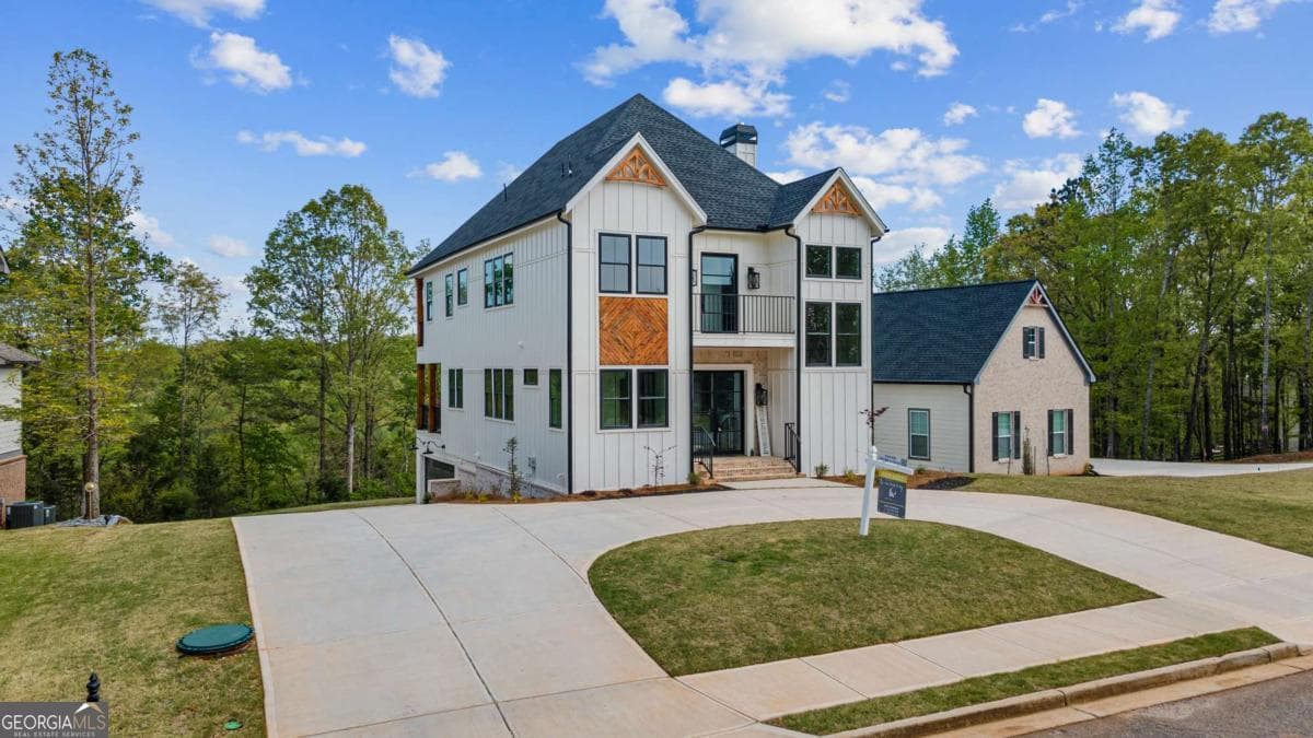 4 bedroom, 4.5 bathroom, 5,316 sq ft single family residence sold at 7410 Crestline Drive, Dawsonville, GA 30534