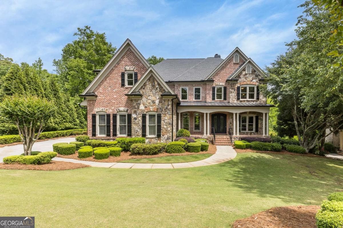 6 bedroom, 5.5 bathroom, 7,104 sq ft single family residence sold at 8740 Islesworth Court, Duluth, GA 30097