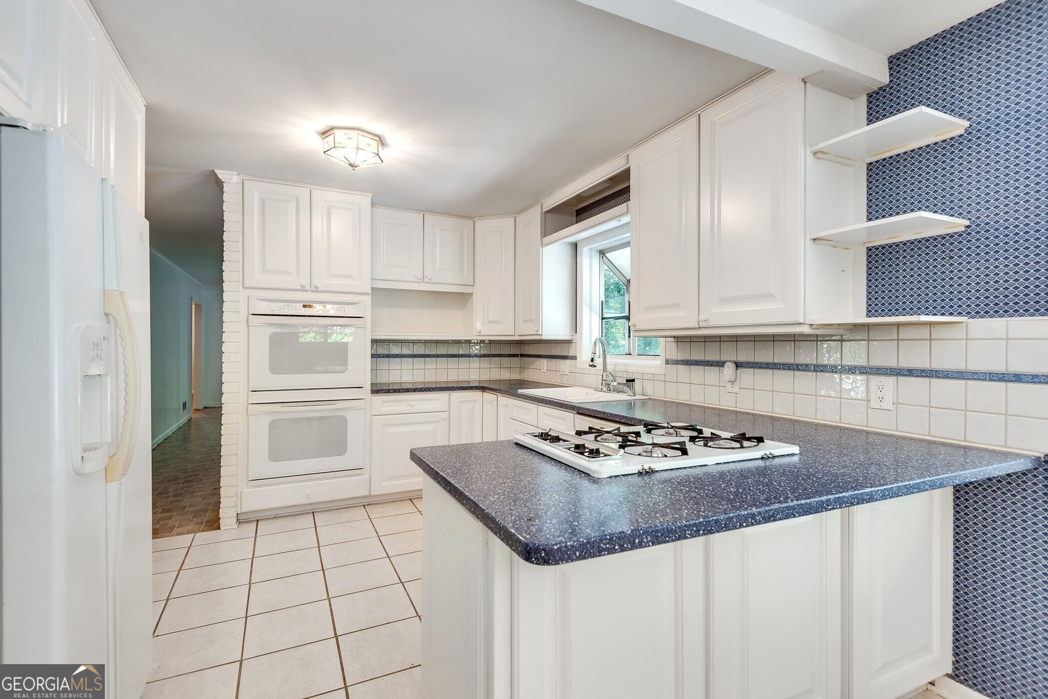 5 bedroom, 3 bathroom, 2,885 sq ft single family residence for sale at 1800 Angelique Drive, Decatur, GA 30033 — photo 6