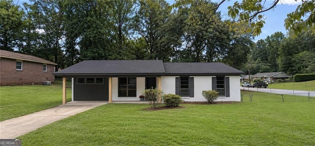 4 bedroom, 2 bathroom, 1,273 sq ft single family residence for sale at 118 Patton Drive, Columbus, GA 31903 — photo 2