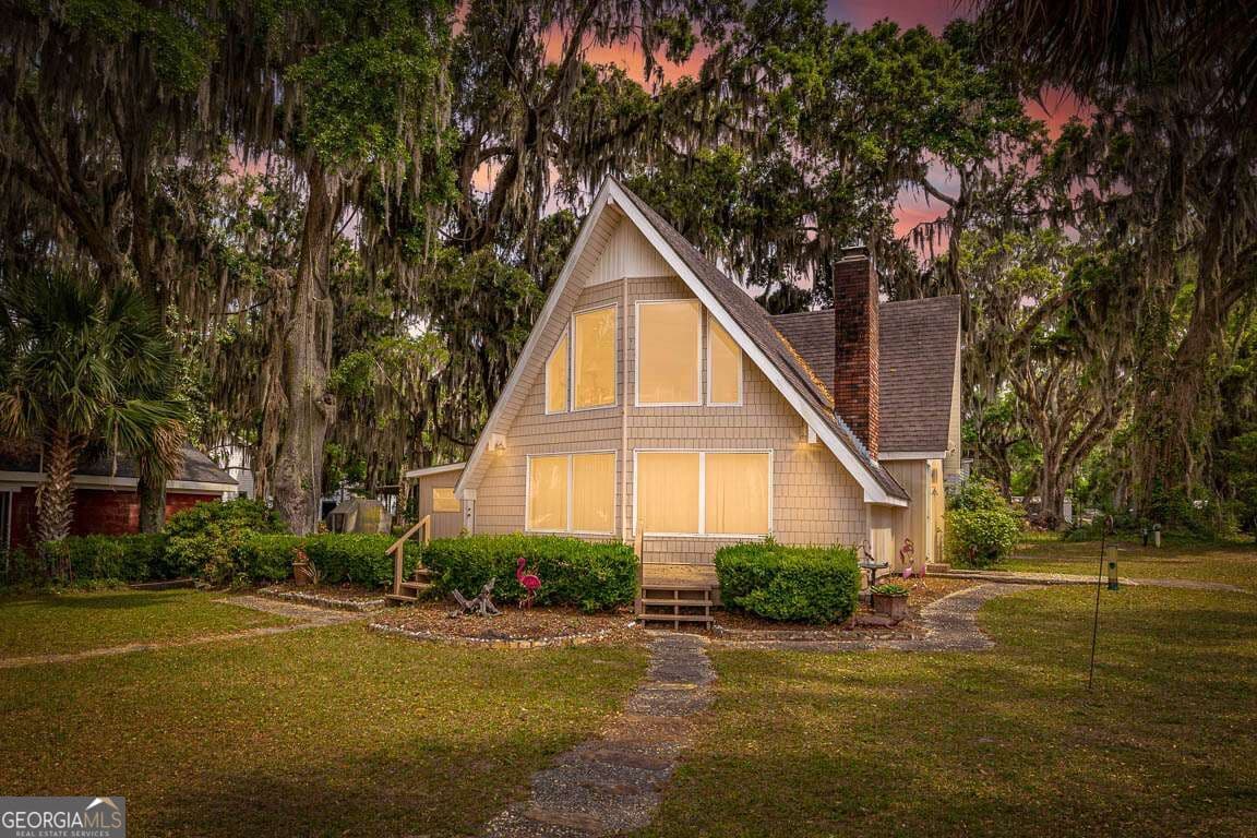 3 bedroom, 2 bathroom, 2,047 sq ft single family residence for sale at 1426 Norman Avenue, Townsend, GA 31331 — photo 2