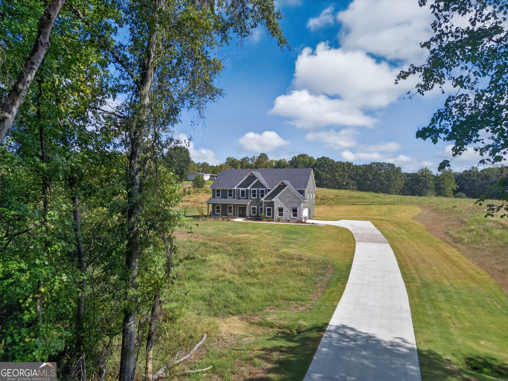 5 bedroom, 3.5 bathroom, 3,717 sq ft single family residence for sale at 3267 W Hwy 5, Bowdon, GA 30108 — photo 2