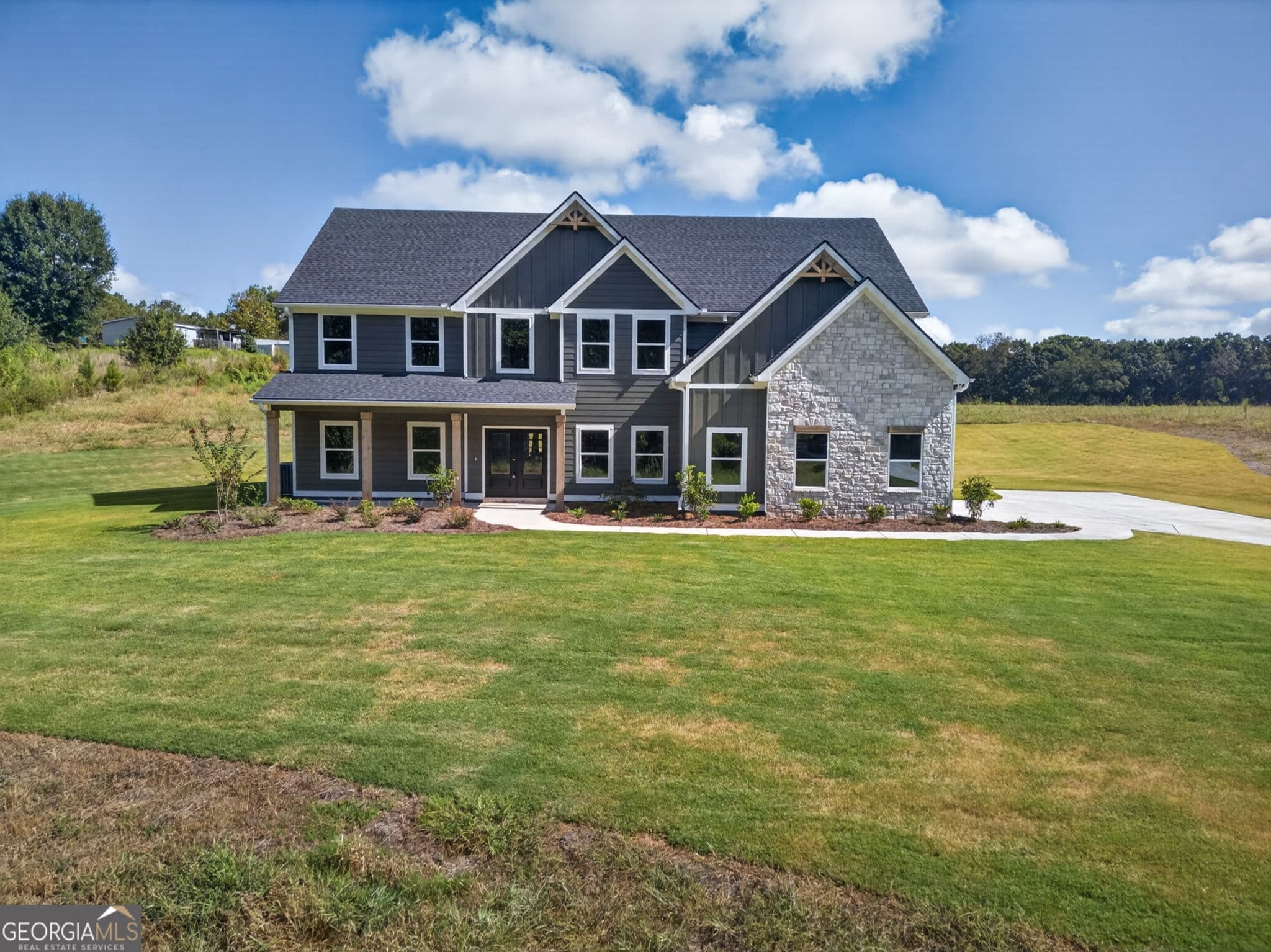 5 bedroom, 3.5 bathroom, 3,717 sq ft single family residence for sale at 3267 W Hwy 5, Bowdon, GA 30108 — photo 3