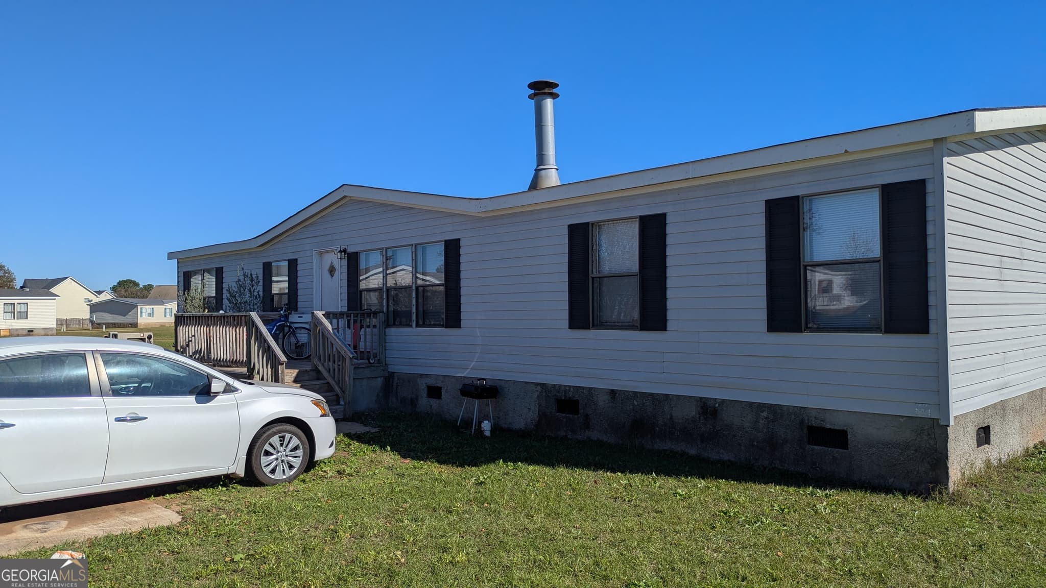 4 bedroom, 2 bathroom, 1,620 sq ft manufactured home,single family residence for sale at 110 Crestmont Court, Byron, GA 31008 — photo 2